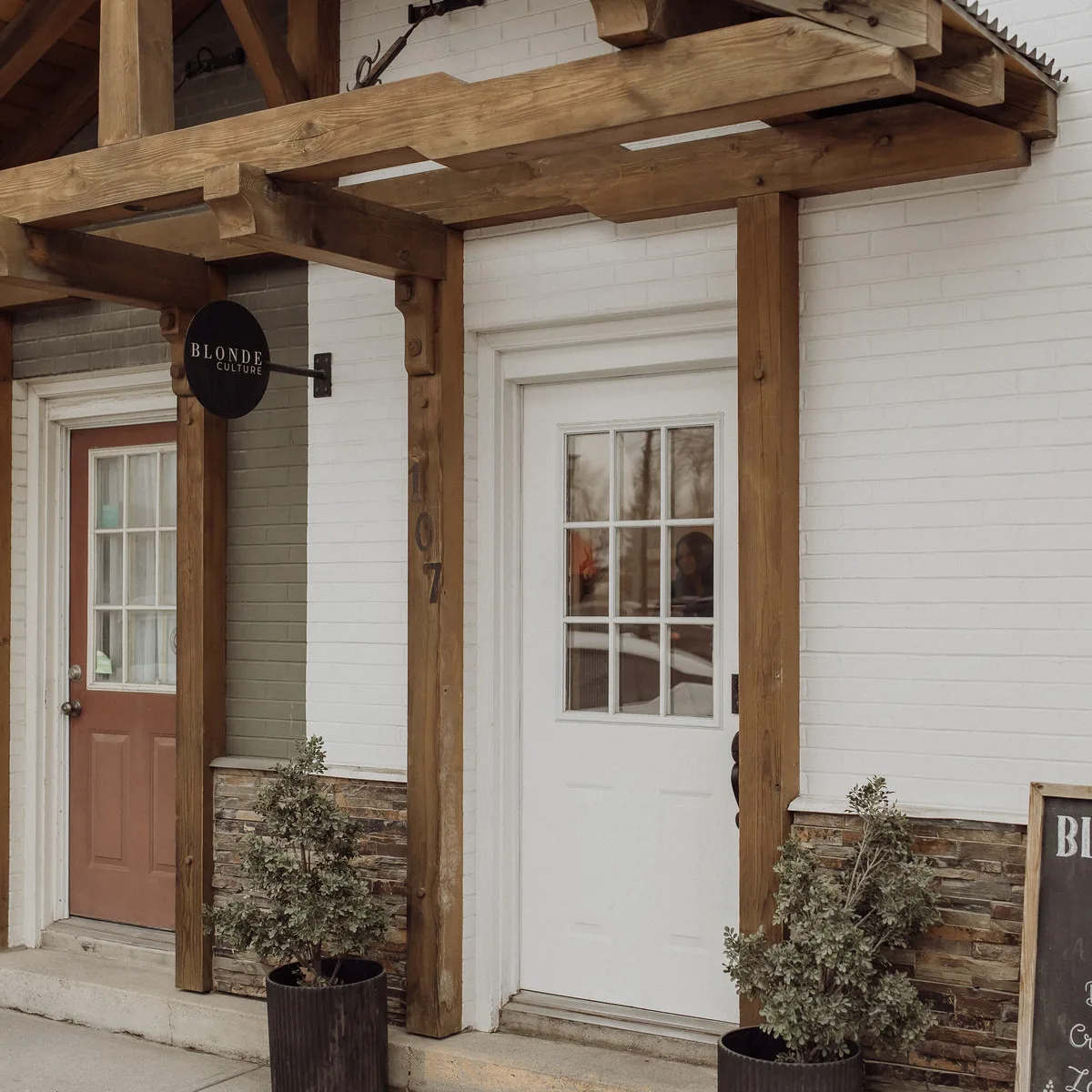 Front door of Blonde Culture on 1 Avenue in Cochrane