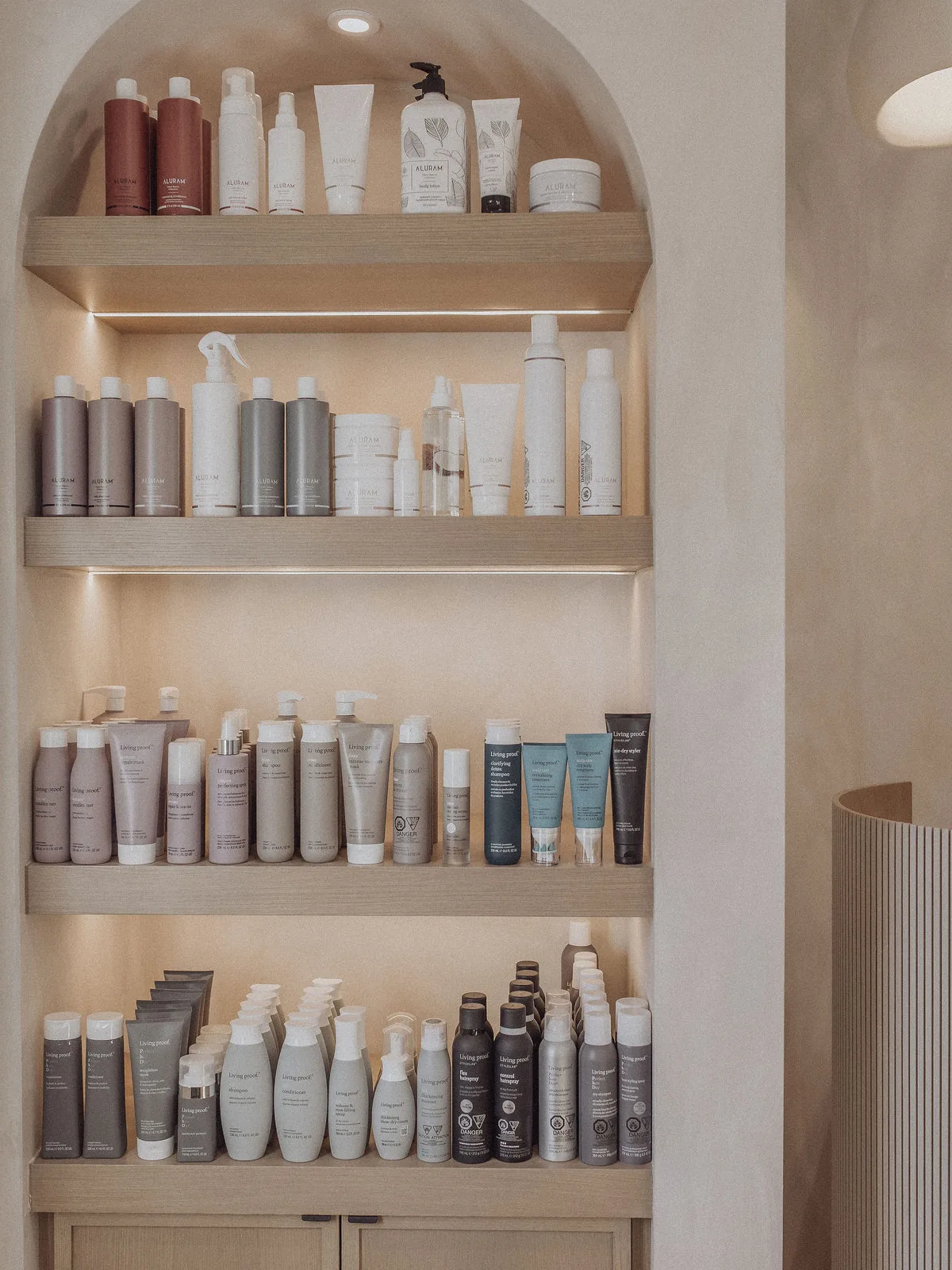 Hair care shelves inside the Blonde Culture hair salon in Cochrane