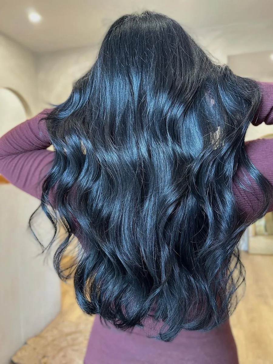 Blonde to glossy black colour change, by Sarah