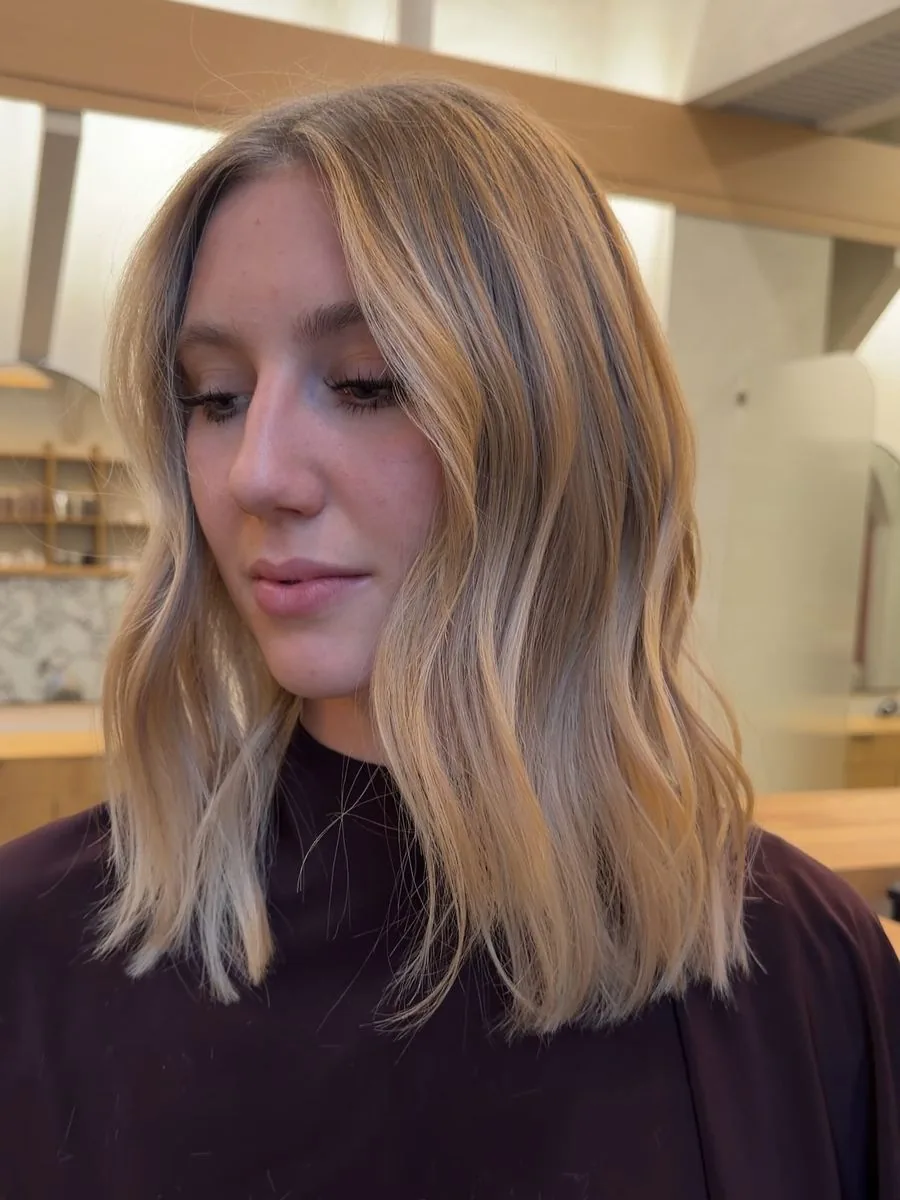 Lived-in blonde lob with soft movement, by Katie